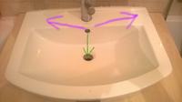 Understanding Water Accumulation in Sink's Inner Basin: Overflow Hole & Drainage Issues