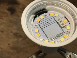 Interior of LED GU10 Bulb with Visible PCB and WiFi Module View of the interior of a LED GU10 bulb with PCB and WiFi module.