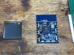 Disassembled TYWE3S Module with ESP8285 Chip TYWE3S module with ESP8285 chip visible after removing the shield.