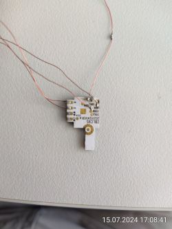 Curtain Module with Wires Curtain module with wires attached, resting on a white surface.