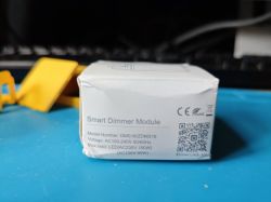 Avatto DMS16 Dimmer Module Box Box on a blue table background with the text Smart Dimmer Module.
