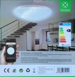Packaging of Woox LED ceiling light with energy efficiency information.