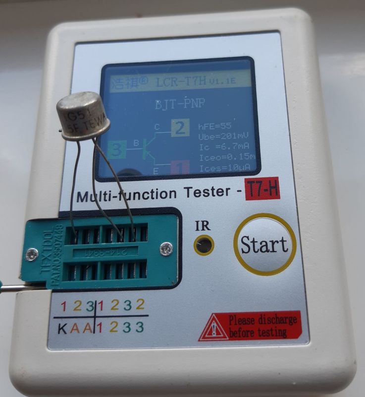 Metal-can transistor connected to an LCR-T7H tester showing BJT-PNP measurement results on the screen