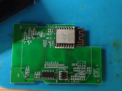 PCB board with ESP8266 Wi-Fi module and various electronic components