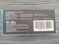 Back of Wi-Fi smart switch packaging with technical and manufacturer information.
