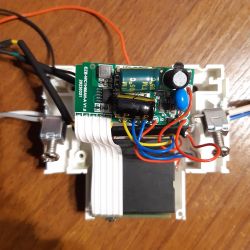 Electronic components and a circuit board inside a device.