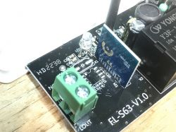 Close-up of the interior of the LXU402 relay module showing the PCB.