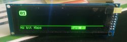 Electronic display with the text 01, Hz bit Kbps, and Bank 01.