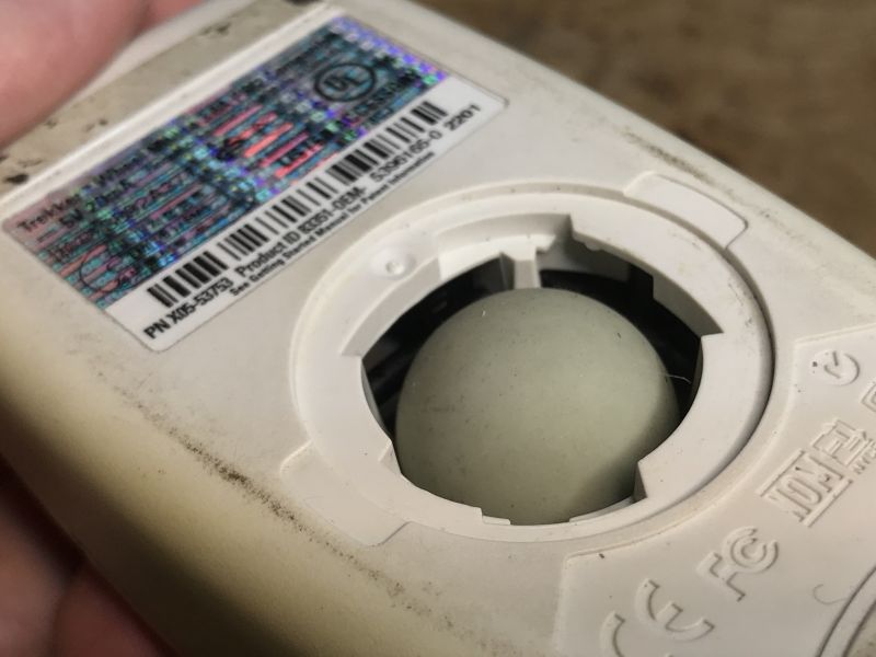 Bottom of Trekker Ball Mouse with Ball Photo of the bottom of an old Trekker ball mouse showing the ball.