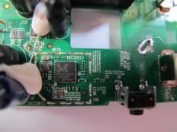 Close-up of RTL8720CF Chip on Circuit Board Close-up of an electronic circuit with a visible RTL8720CF chip.