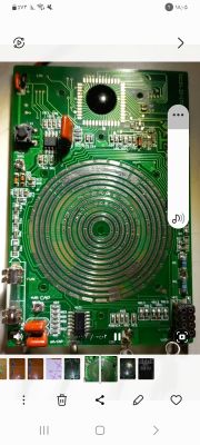 Interior of a PCB from a multimeter with spiral tracks.