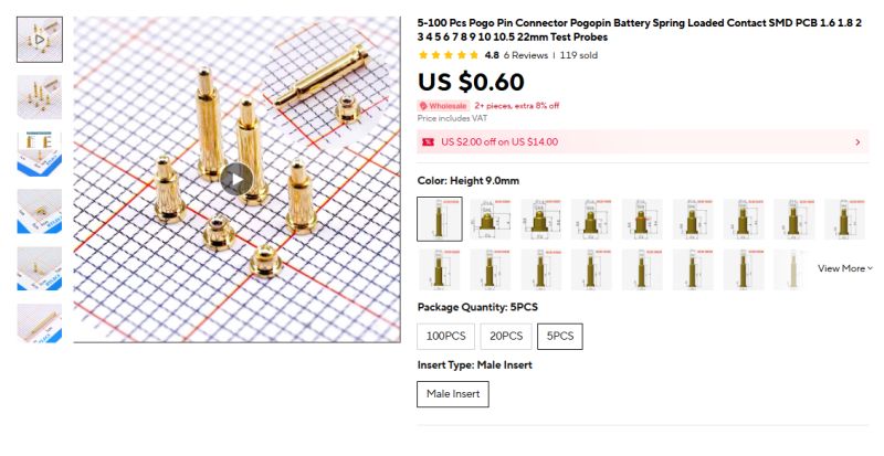 Set of 5 gold-plated pogo pins, 9 mm high, on millimeter grid background