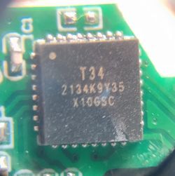 Close-up of T34 integrated circuit on a PCB.