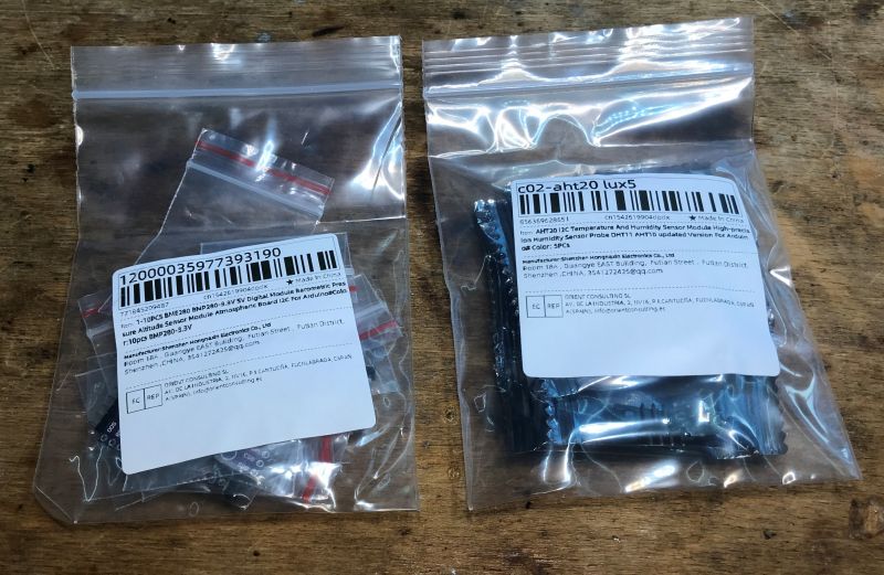 Two plastic bags with BMP280 and AHT20 sensors.