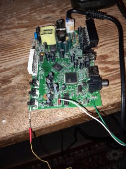 Opticum HD N2 tuner board with UART wires soldered to pin header