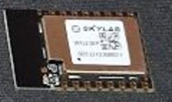 Electronic module with Skylab branding and markings.