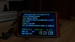 LCD screen showing audio file playback info from a microcontroller device