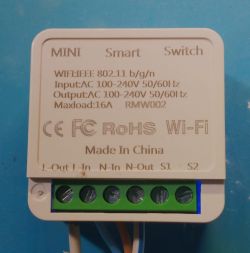 Mini Smart Switch RMW002 Mini Smart Switch model RMW002 on a blue background with technical specifications.
