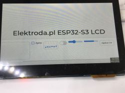 Graphical interface on ESP32-S3 Touch LCD 4.3 module The ESP32-S3 LCD 4.3 touchscreen displays a graphical interface with a label, checkbox, chart, slider, and dropdown menu.