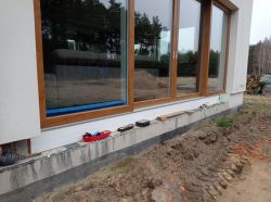 jak dobudować ścianę fundamentową do instniejącego budynku