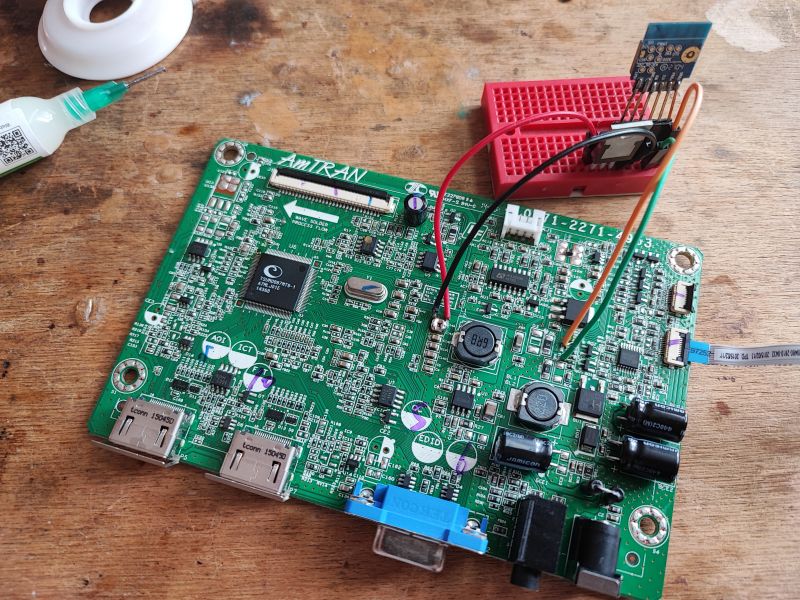 Monitor Circuit Board with Connected WiFi Module Circuit board from a monitor with a connected WiFi module.
