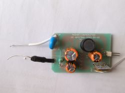 Circuit board with various electronic components.