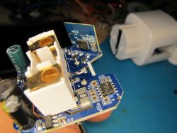 Disassembled LSPA9 Smart Plug with WR2E Module Disassembled smart plug with WR2E module.