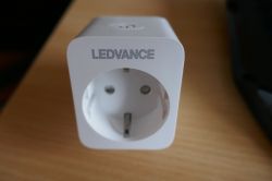 LEDVANCE Smart+ Smart Plug Close-up of a LEDVANCE Smart+ smart plug on a desk.
