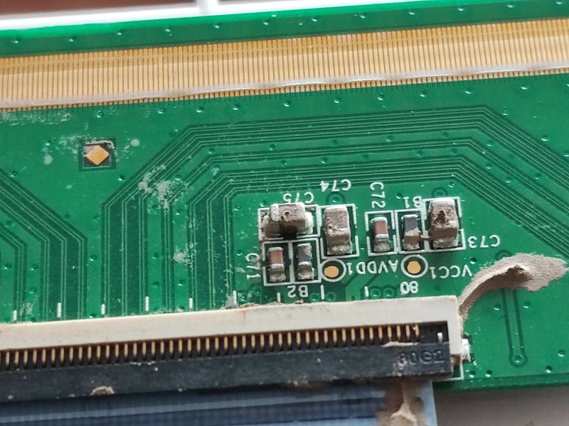 Flood-Damaged TV Circuit Board Dirty circuit board from a flood-damaged TV.
