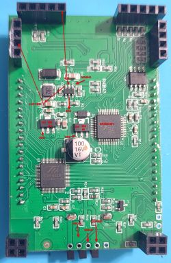 PCB with microcontrollers, header pins and labeled components