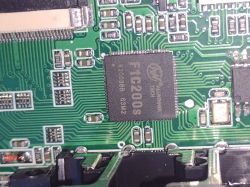 Close-up of a circuit board with Allwinner Tech F1C200s IC.