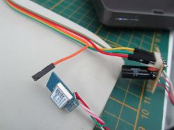 MOES MS108WR Curtain Switch Module with Wiring MOES MS108WR curtain switch module with connected wires.