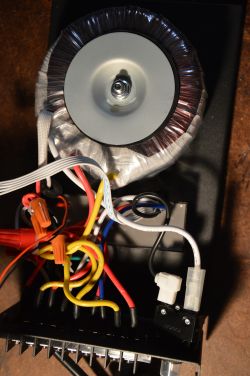 Low voltage transformer with colored wires and connectors.