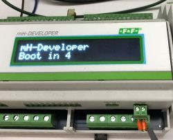 F&amp;F building automation controller with display showing mH-Developer Boot in 4.