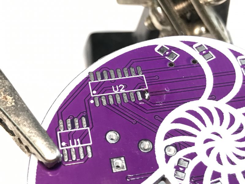 PCB for SMD Soldering Kit Close-up of a purple PCB for an SMD soldering kit.
