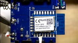 PCB of a device with CB3S module, showing solder points and wires.