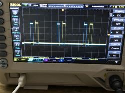 Oscilloscope display showing PWM waveforms on a RIGOL screen.