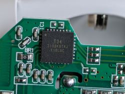 Close-up of a circuit board with a chip labeled T34.
