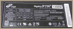 Naklejka na zasilaczu ATX model FSP Hydro PTM+ 1200W z danymi technicznymi.