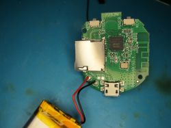 PCB with Battery and Micro USB Socket Printed circuit board with a connected battery and micro USB socket.