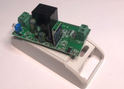 Electronic Circuit of ATLO-B1-Tuya Relay Electronic circuit of ATLO-B1-Tuya relay on a white casing with visible electronic components.
