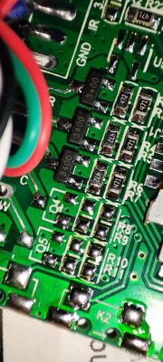 Close-up of a circuit board with visible electronic components and traces.