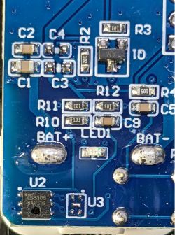 A circuit board with electronic components, labels, and a CHT8305 sensor.