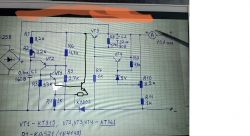 Rysunek schematu elektronicznego z różnymi komponentami i oznaczeniami.
