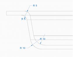 Szkic techniczny z zaokrągleniami oznaczonymi jako R5 i R10, pokazany w programie FreeCAD.