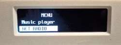 Menu screen with options Music player and highlighted Net Radio.