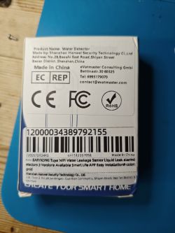 Water leak detector packaging with barcodes and manufacturer information.