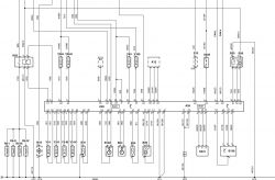 Fragment schematu elektrycznego z symbolami i oznaczeniami komponentów