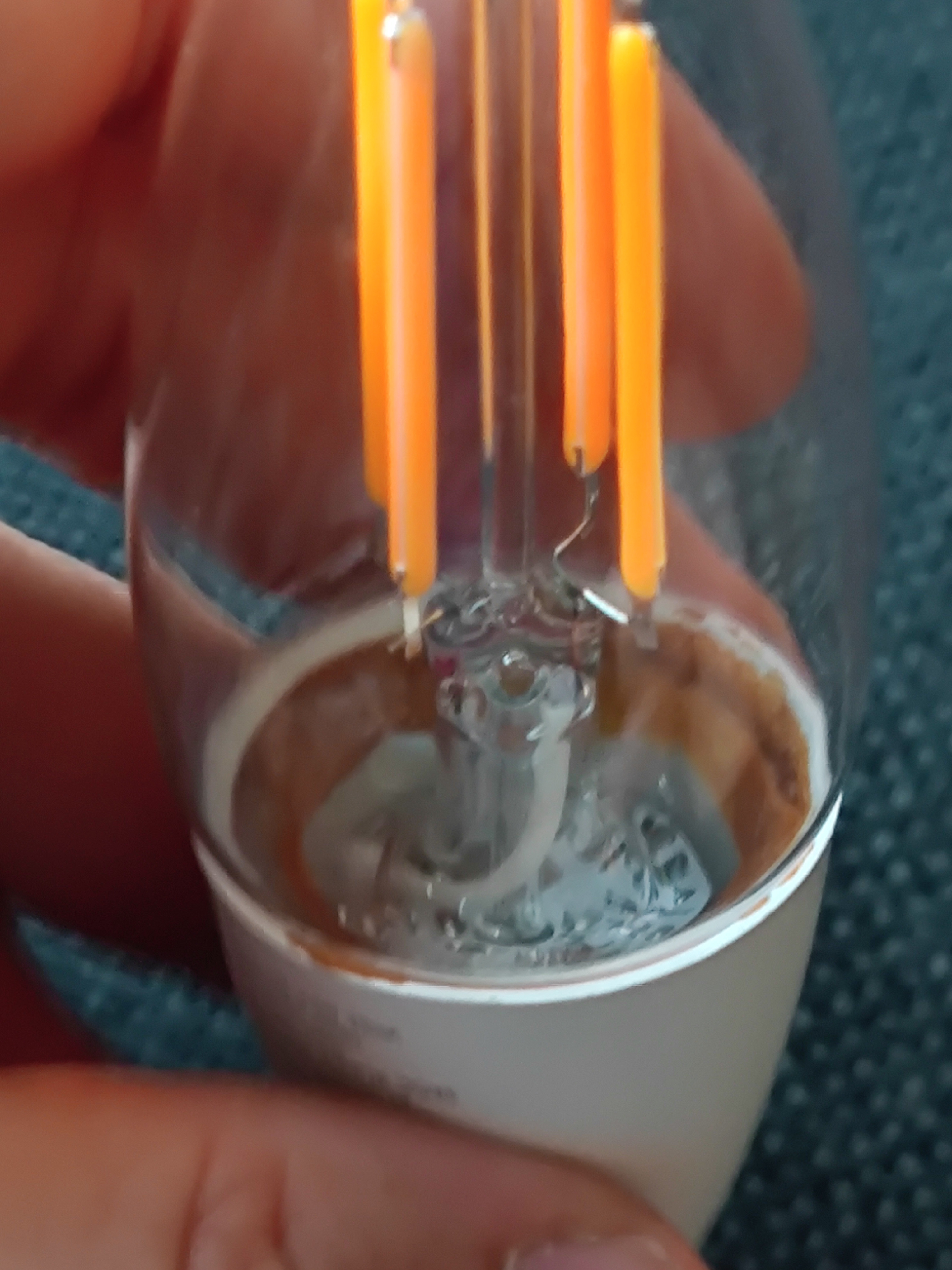 Identifying the Purpose of a Disconnected White Wire in a Lamp Assembly