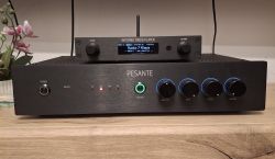 Black PESANTE audio amplifier with blue-rimmed knobs and an internet radio player on top